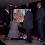 Emil signing the live painting w/ Ken Griffey and Lynn Merrit
